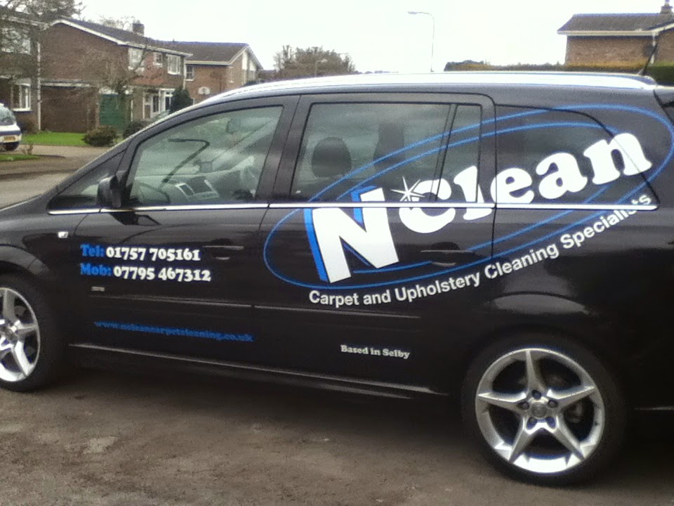 The N Clean van in its black livery with the NClean logo, phone numbers and Based in Selby
